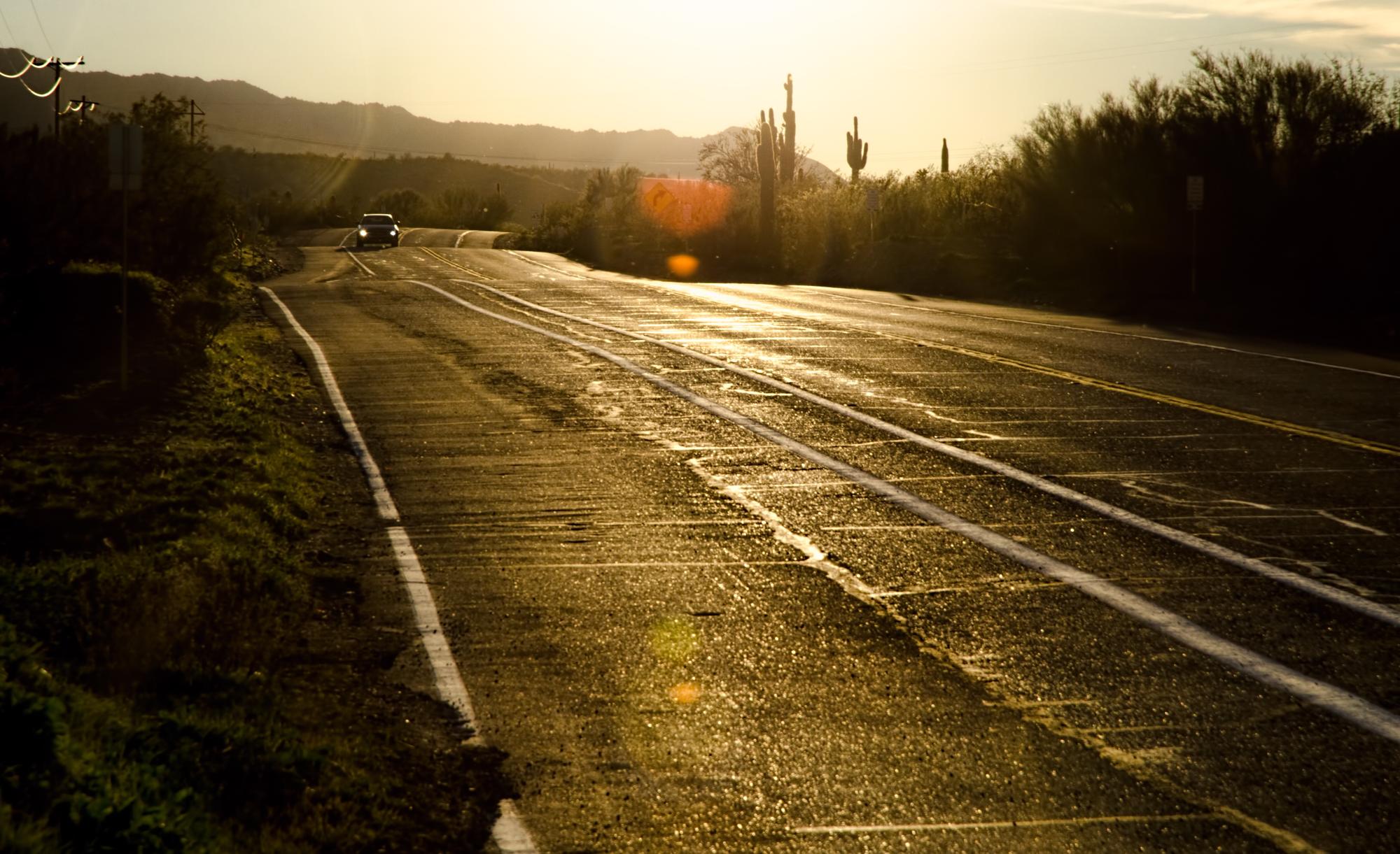 Sun-baked Arizona road at golden hour